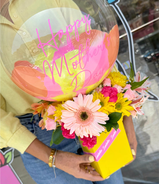 Arreglo de flores con burbuja